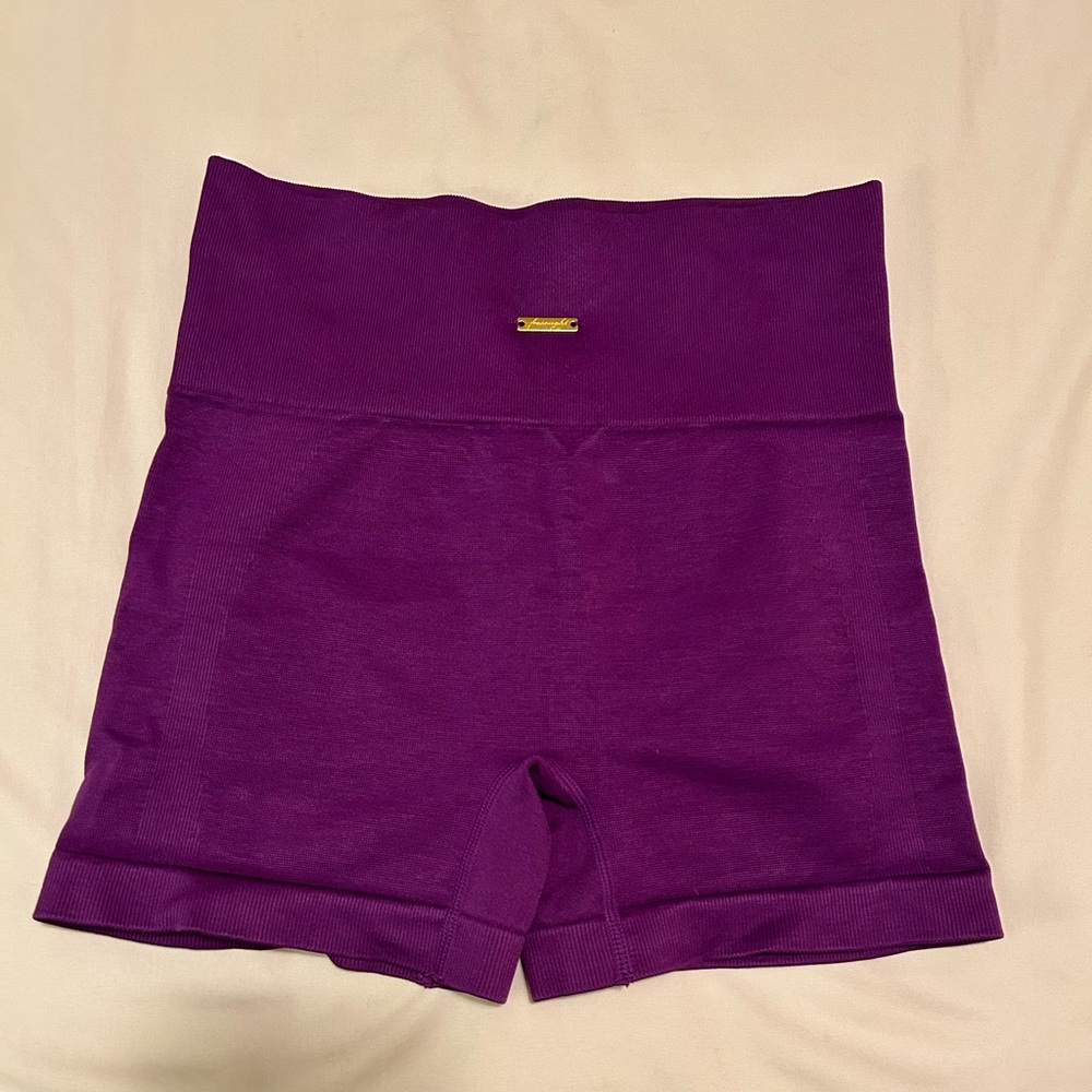 Purple spandex athletic shorts